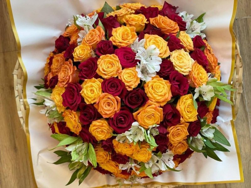Mix of red, orange, and yellow roses Mix of red, orange, and yellow roses